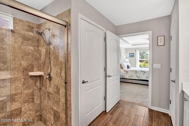 328 Falcon Quest Ln, Saint Augustine, FL 32095 - ensuite bathroom with a stall shower, wood finish floors, and vanity