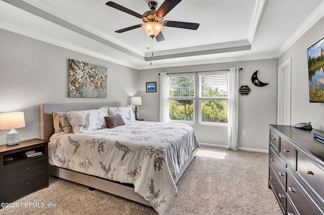 328 Falcon Quest Ln, Saint Augustine, FL 32095 - bedroom with a raised ceiling, crown molding, light carpet, ceiling fan, and a textured ceiling