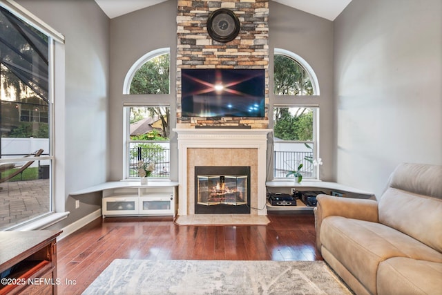 3746 Cardinal Oaks Cir, Orange Park, FL 32065 - living room with lofted ceiling, a fireplace, and wood-type flooring
