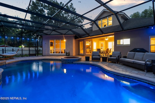 3746 Cardinal Oaks Cir, Orange Park, FL 32065 - view of pool with an outdoor living space, a patio area, a pool with connected hot tub, a lanai, and a ceiling fan
