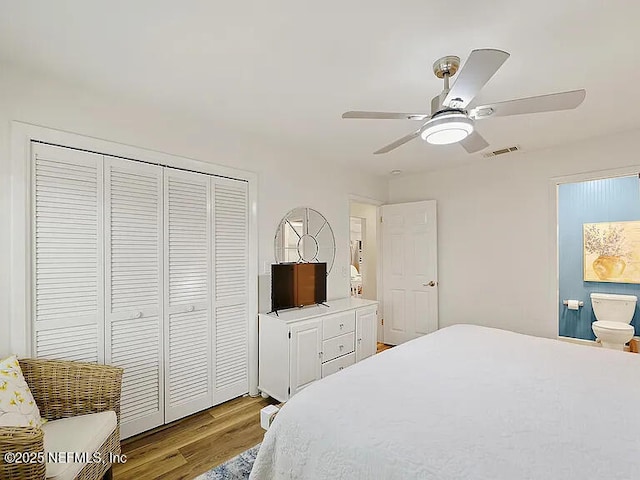 2700 Mizell Ave Unit 402B, Fernandina Beach, FL 32034 - bedroom with wood finished floors, a closet, and ceiling fan