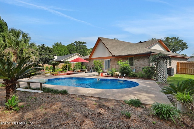 5604 Swamp Fox Rd, Jacksonville, FL 32210 - outdoor pool featuring a patio area and central AC