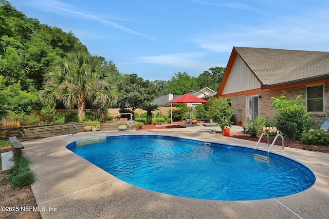 5604 Swamp Fox Rd, Jacksonville, FL 32210 - view of swimming pool with a patio area