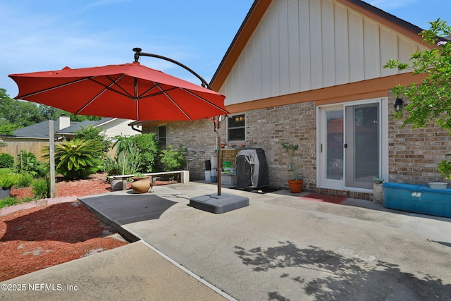 5604 Swamp Fox Rd, Jacksonville, FL 32210 - view of patio featuring a grill