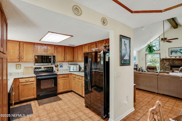 5604 Swamp Fox Rd, Jacksonville, FL 32210 - kitchen with black appliances, open floor plan, light countertops, a textured ceiling, and ceiling fan
