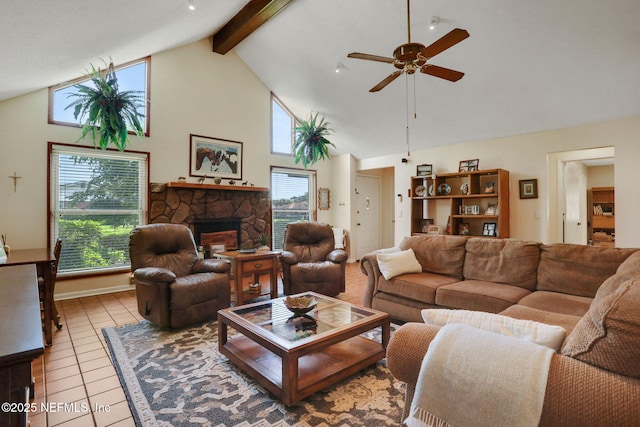 5604 Swamp Fox Rd, Jacksonville, FL 32210 - living area with a ceiling fan, high vaulted ceiling, a stone fireplace, beamed ceiling, and tile patterned flooring