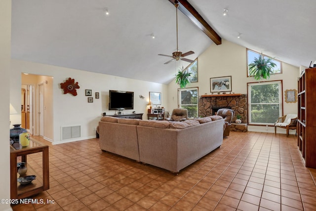 5604 Swamp Fox Rd, Jacksonville, FL 32210 - living room with high vaulted ceiling, a ceiling fan, beam ceiling, a fireplace, and healthy amount of natural light