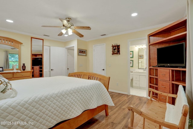 5604 Swamp Fox Rd, Jacksonville, FL 32210 - bedroom featuring light wood-style floors, recessed lighting, crown molding, ensuite bath, and ceiling fan