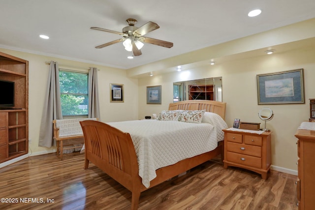 5604 Swamp Fox Rd, Jacksonville, FL 32210 - bedroom featuring wood finished floors, baseboards, recessed lighting, ceiling fan, and crown molding