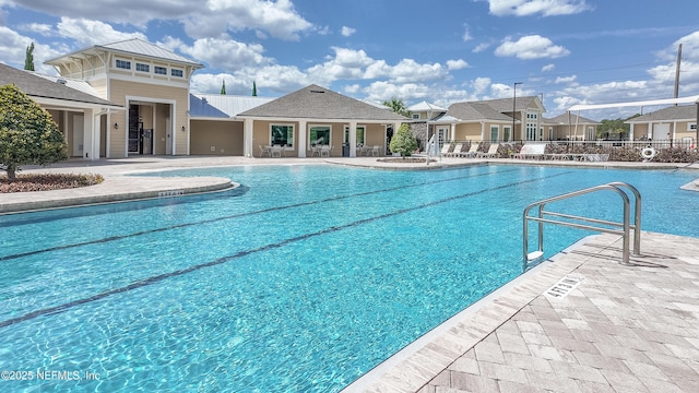 2719 Oak Stream Dr, Green Cove Springs, FL 32043 - community pool featuring a residential view and a patio area