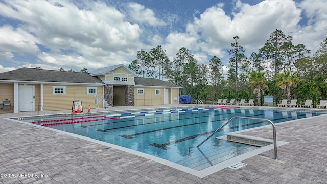 2719 Oak Stream Dr, Green Cove Springs, FL 32043 - community pool featuring a patio area