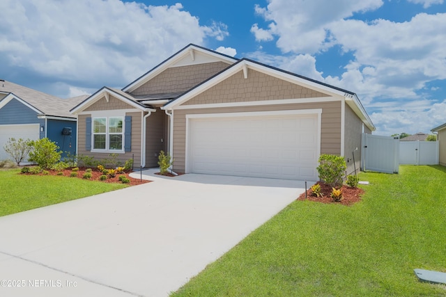 2719 Oak Stream Dr, Green Cove Springs, FL 32043 - view of front of property featuring an attached garage, concrete driveway, and a gate