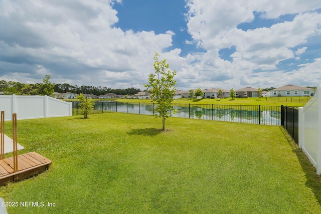 2719 Oak Stream Dr, Green Cove Springs, FL 32043 - view of yard featuring a residential view and a deck with water view