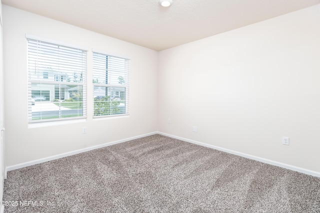 2719 Oak Stream Dr, Green Cove Springs, FL 32043 - empty room featuring carpet floors and baseboards