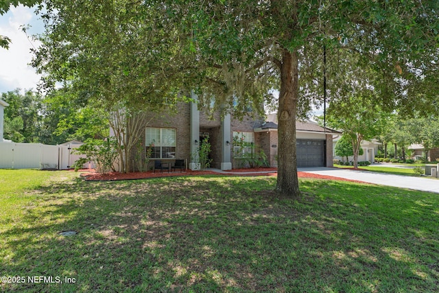 521 Cedar Arbor Ct, Saint Augustine, FL 32084 - view of front facade featuring brick siding, concrete driveway, a garage, and a gate