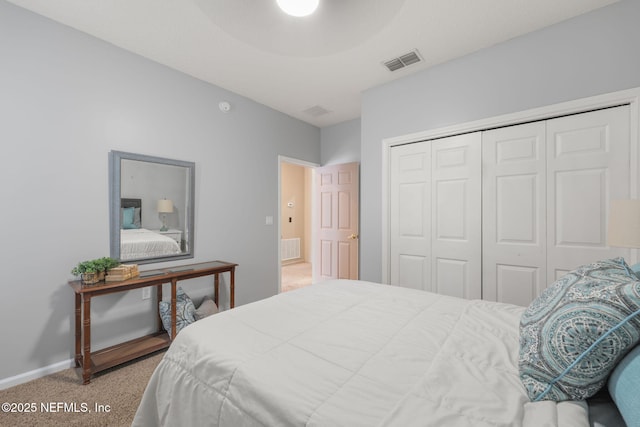 521 Cedar Arbor Ct, Saint Augustine, FL 32084 - carpeted bedroom featuring a closet and baseboards