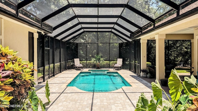 2708 Shade Tree Dr, Fleming Island, FL 32003 - swimming pool featuring a patio and glass enclosure
