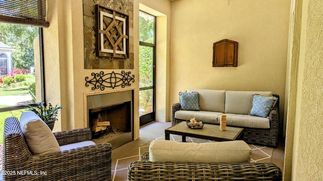 2708 Shade Tree Dr, Fleming Island, FL 32003 - living room with a textured wall and a fireplace