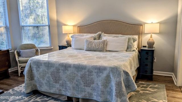 2708 Shade Tree Dr, Fleming Island, FL 32003 - bedroom with wood finished floors and baseboards