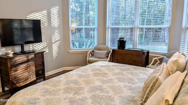 2708 Shade Tree Dr, Fleming Island, FL 32003 - bedroom with baseboards and wood finished floors