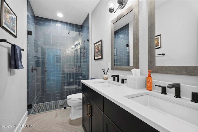 199 Ranch Land Cir, Saint Johns, FL 32259 - bathroom with toilet, double vanity, a shower stall, and baseboards