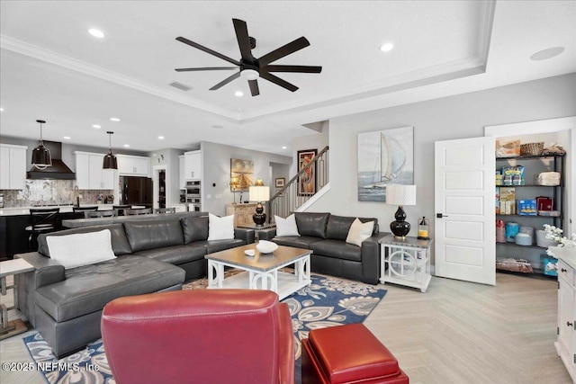 199 Ranch Land Cir, Saint Johns, FL 32259 - living room featuring ceiling fan, a tray ceiling, stairway, recessed lighting, and crown molding