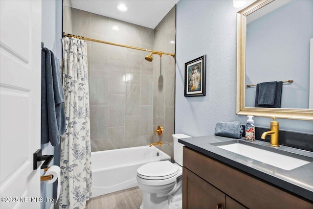 199 Ranch Land Cir, Saint Johns, FL 32259 - bathroom with vanity, shower / tub combo, toilet, wood finished floors, and a textured wall