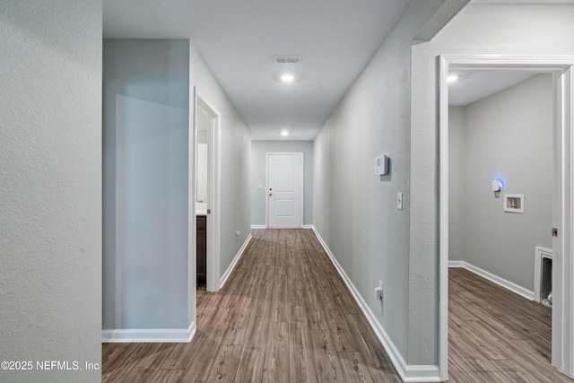 8552 Lake George Cir W, Macclenny, FL 32063 - corridor featuring wood finished floors, baseboards, and recessed lighting
