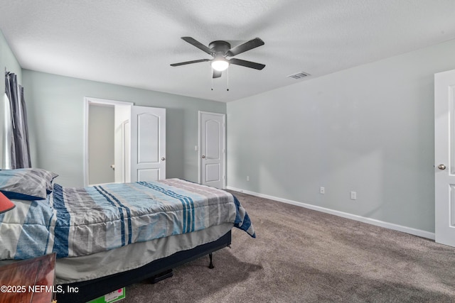8552 Lake George Cir W, Macclenny, FL 32063 - bedroom with baseboards, carpet flooring, a textured ceiling, and a ceiling fan