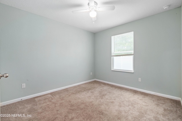 8552 Lake George Cir W, Macclenny, FL 32063 - unfurnished room featuring a ceiling fan, carpet, a smoke detector, and baseboards