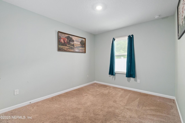 8552 Lake George Cir W, Macclenny, FL 32063 - spare room with carpet, baseboards, and a smoke detector