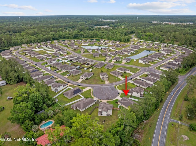 8552 Lake George Cir W, Macclenny, FL 32063 - aerial overview of property's location featuring a heavily wooded area and nearby suburban area