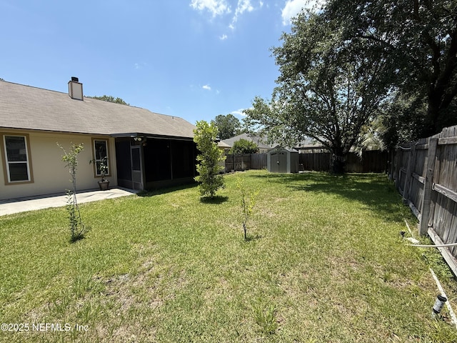 9205 Camshire Dr, Jacksonville, FL 32244 - view of yard with a sunroom and a patio area