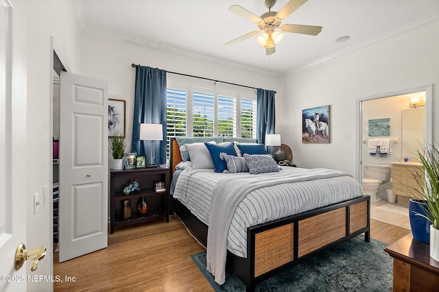 5 Augusta Trl, Palm Coast, FL 32137 - bedroom with wood finished floors, ornamental molding, connected bathroom, and a ceiling fan