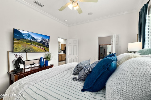 5 Augusta Trl, Palm Coast, FL 32137 - bedroom featuring ornamental molding, ceiling fan, and ensuite bathroom