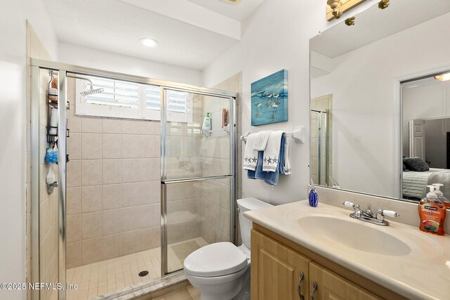 5 Augusta Trl, Palm Coast, FL 32137 - bathroom featuring toilet, a stall shower, and vanity