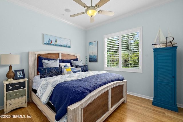 5 Augusta Trl, Palm Coast, FL 32137 - bedroom featuring crown molding, wood finished floors, baseboards, and ceiling fan