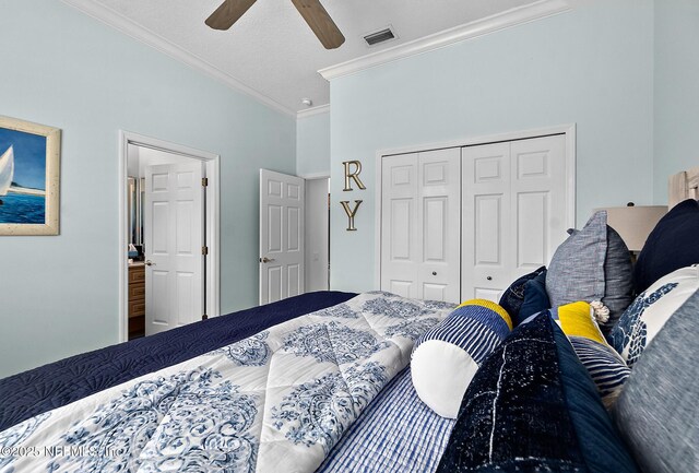5 Augusta Trl, Palm Coast, FL 32137 - bedroom featuring ornamental molding, a closet, and ceiling fan