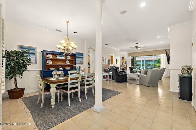 5 Augusta Trl, Palm Coast, FL 32137 - dining space featuring crown molding, light tile patterned flooring, ceiling fan, ornate columns, and a chandelier