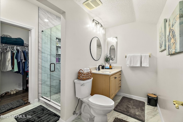 5 Augusta Trl, Palm Coast, FL 32137 - bathroom with marble look tiles, toilet, vanity, baseboards, and a shower stall