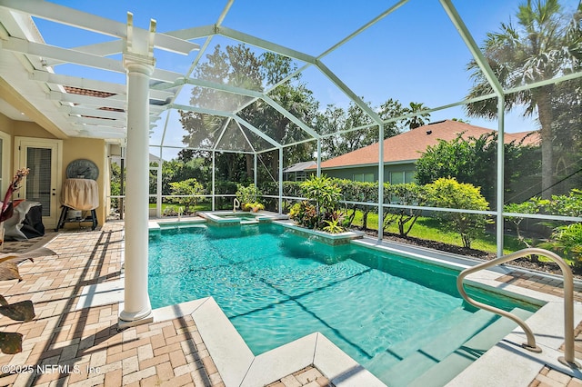 5 Augusta Trl, Palm Coast, FL 32137 - view of pool with a pool with connected hot tub, a patio, and a lanai