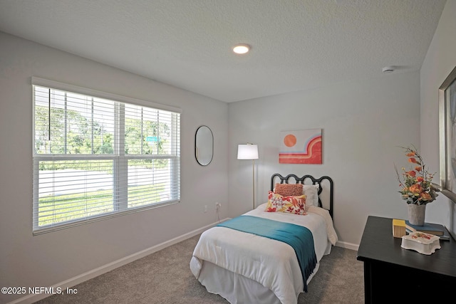 12252 Lyons St, Jacksonville, FL 32224 - bedroom featuring carpet flooring, baseboards, and a textured ceiling