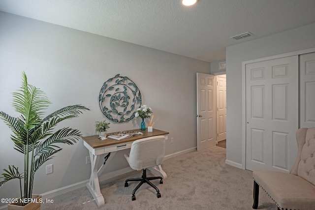 12252 Lyons St, Jacksonville, FL 32224 - office area featuring light colored carpet, baseboards, and a textured ceiling