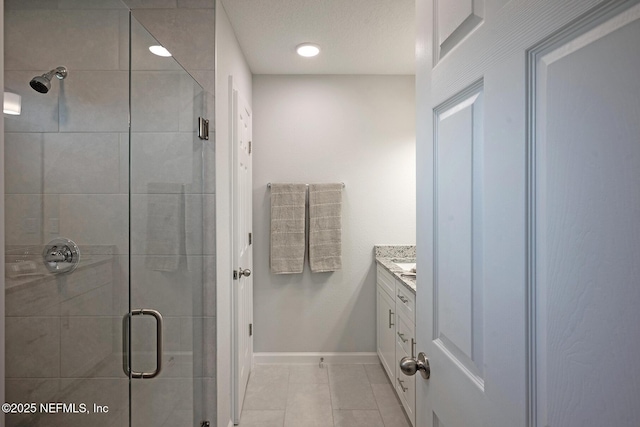 12252 Lyons St, Jacksonville, FL 32224 - full bath with a stall shower, vanity, tile patterned floors, baseboards, and recessed lighting