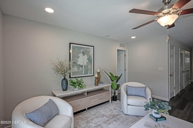 12252 Lyons St, Jacksonville, FL 32224 - living area with wood finished floors, ceiling fan, baseboards, and recessed lighting