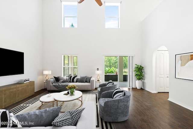 65074 Mossy Creek Ln, Yulee, FL 32097 - living area featuring a high ceiling, healthy amount of natural light, wood finished floors, and ceiling fan