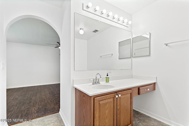 65074 Mossy Creek Ln, Yulee, FL 32097 - bathroom with vanity, ceiling fan, and baseboards