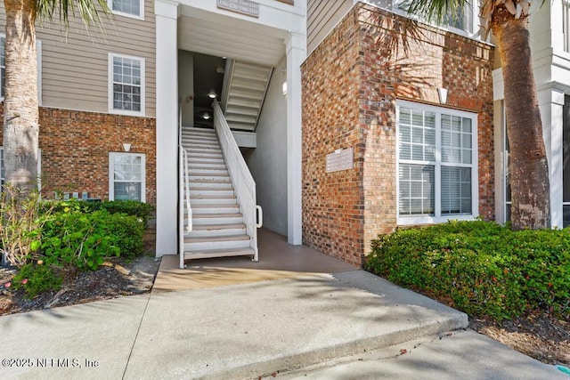 11251 Campfield Dr Unit 4107, Jacksonville, FL 32256 - view of exterior entry with brick siding