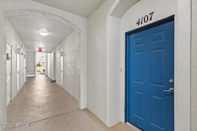 11251 Campfield Dr Unit 4107, Jacksonville, FL 32256 - doorway to property with stucco siding