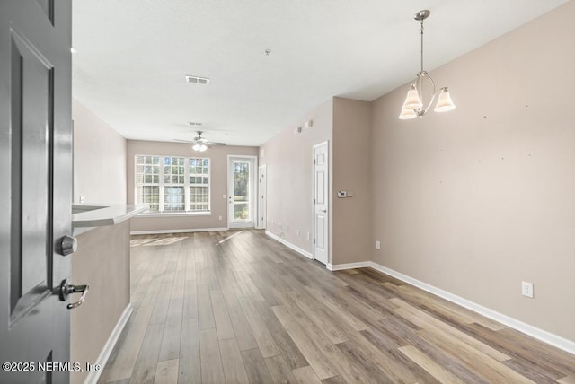 11251 Campfield Dr Unit 4107, Jacksonville, FL 32256 - spare room with wood finished floors, ceiling fan, and baseboards